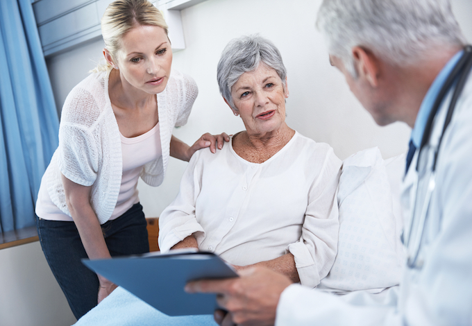 Stock photo of older female patient with her doctor