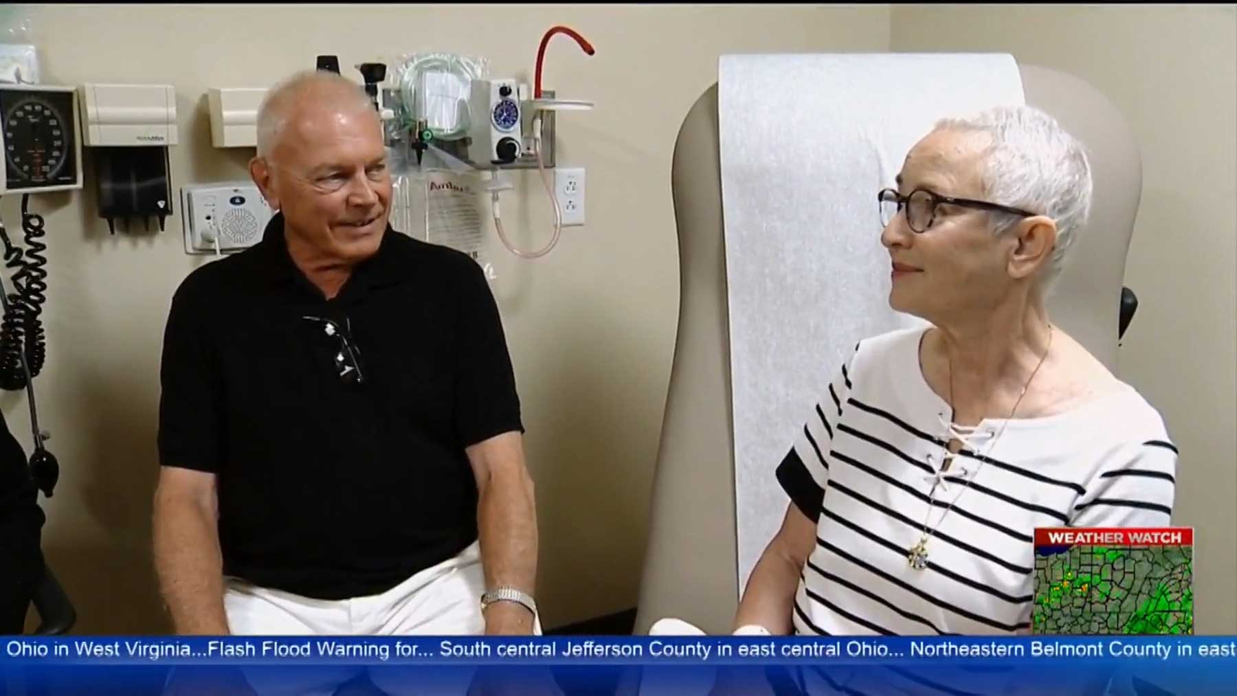 News Clip Still - Older couple in doctor's office