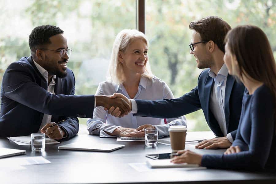 Business people having a meeting and shaking hands